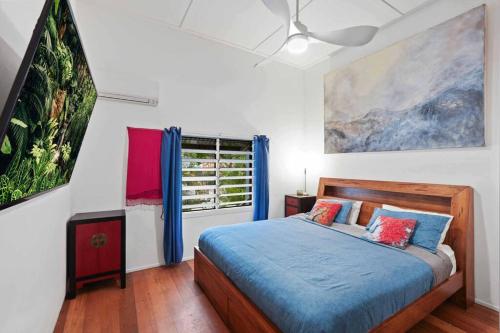 Ένα ή περισσότερα κρεβάτια σε δωμάτιο στο Beachside Traditional Queenslander - Close to City