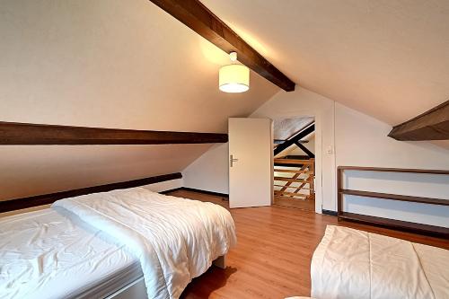 Posteľ alebo postele v izbe v ubytovaní Panoramika - Maison pour 14 vue montagne