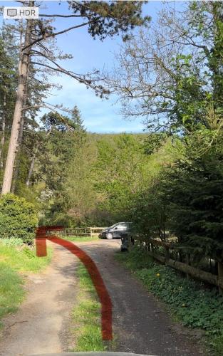 a road with a red line on the side of it at Chata Markétka in Křivoklát