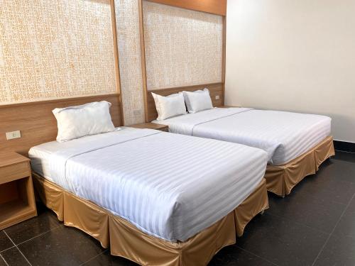 Llit o llits en una habitació de MIỀN TÂY HOTEL CANTHO