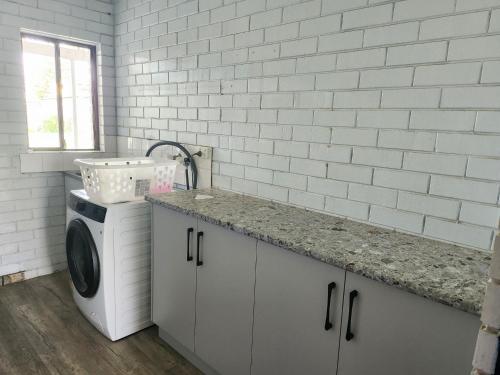 Kuchyň nebo kuchyňský kout v ubytování Sands Beach House