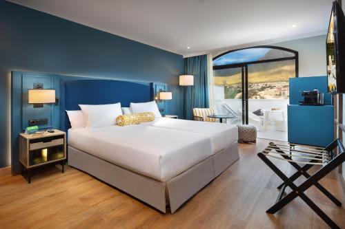 Кровать или кровати в номере Princess Inspire Tenerife - Adults Only