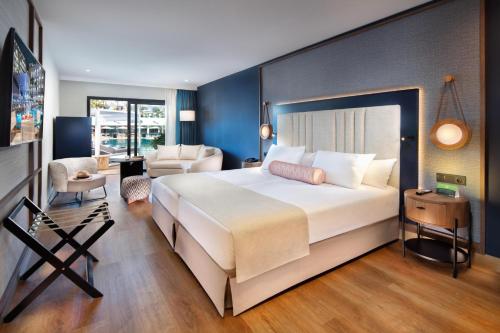 Кровать или кровати в номере Princess Inspire Tenerife - Adults Only