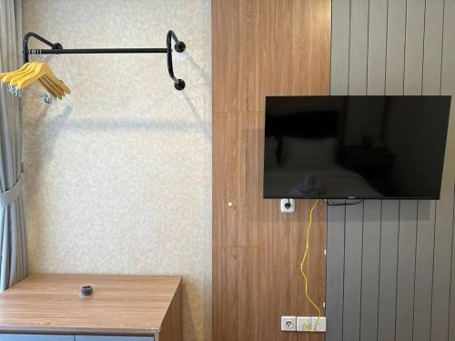 TV a/nebo společenská místnost v ubytování goldcoast studio europe sofabed wifi netflix