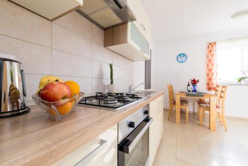 Η κουζίνα ή μικρή κουζίνα στο Apartment Krk David & Matej