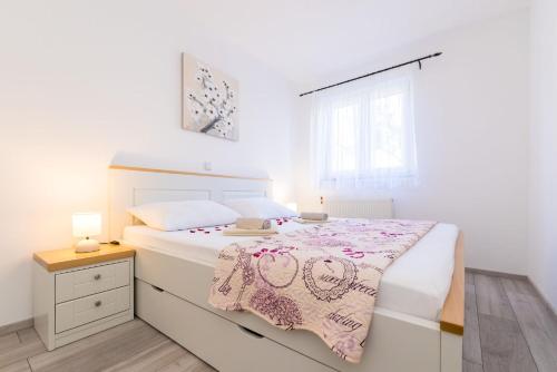 Ένα ή περισσότερα κρεβάτια σε δωμάτιο στο Apartment Krk David & Matej