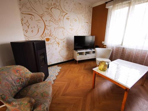 Et tv og/eller underholdning på Maison de vacances pour 12 personnes