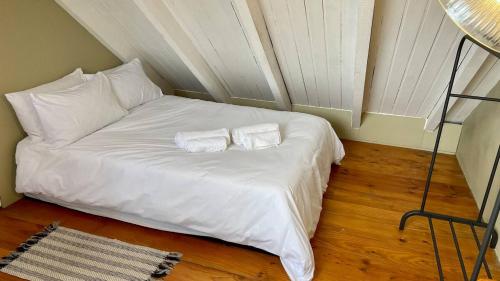 Ένα ή περισσότερα κρεβάτια σε δωμάτιο στο 2 Bedroom Cottage by ARPA Hospitalities