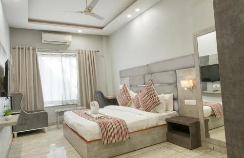 Postel nebo postele na pokoji v ubytování Hotel Vasdaa Grand