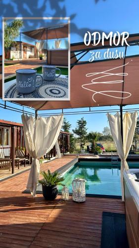 a view of a swimming pool and a deck with a house at Morena in Ulcinj