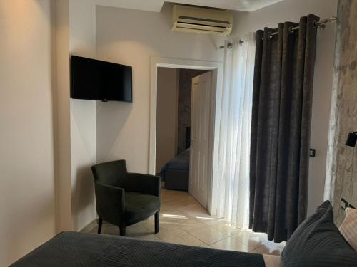 Hotel Ergiにあるテレビまたはエンターテインメントセンター