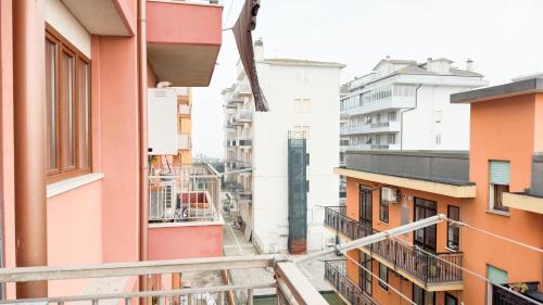 a view from the balcony of an apartment building at Esperia Apartment by Ca-Sa Check in Chioggia