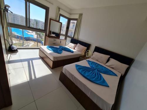 En eller flere senge i et værelse på Studio apartment, Marassi, North coast