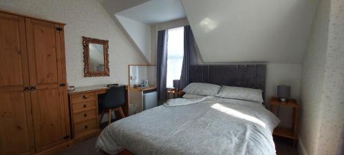 Llit o llits en una habitació de Invernook