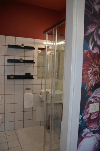 a bathroom with a sink and a mirror at Interno 23 Duomo Apartment in Udine