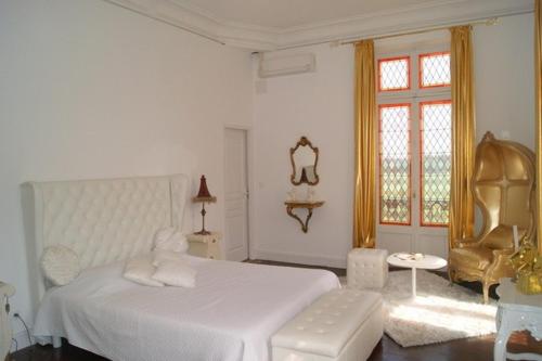 Postel nebo postele na pokoji v ubytování Château de La Prade