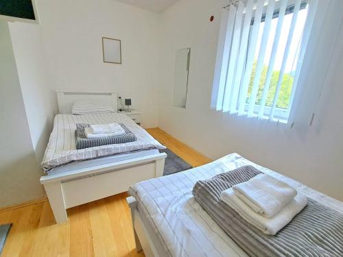 Cama o camas de una habitación en Sobe Zizi