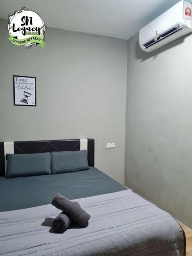 Postel nebo postele na pokoji v ubytování Hotel SN Legacy