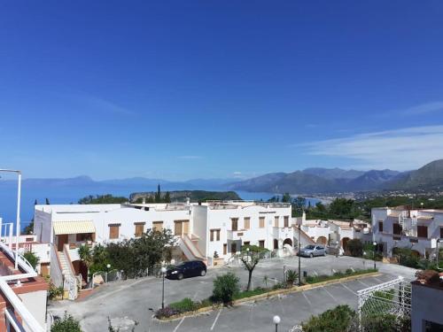 arial view of a city with buildings and a street at Casa vista mare in San Nicola Arcella
