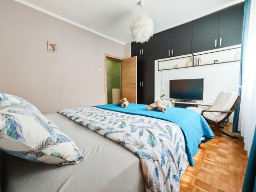 Cama o camas de una habitación en Apartman Julija