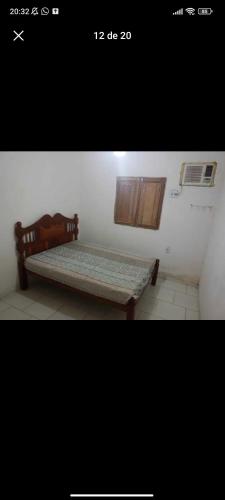 een foto van een bed in een kamer bij Casa de praia Tamandaré in Tamandaré