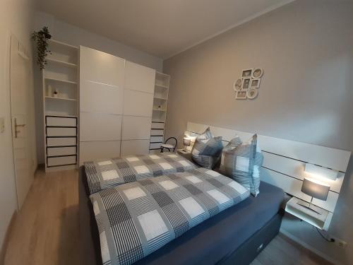 Tempat tidur dalam kamar di Gästewohnung zum Heiligen Grund