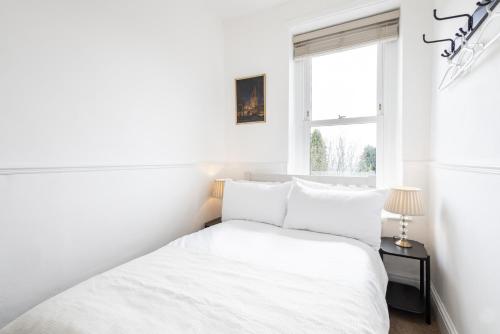 Ένα ή περισσότερα κρεβάτια σε δωμάτιο στο Host & Stay - Rock End