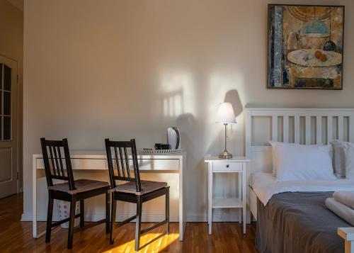 Postel nebo postele na pokoji v ubytování Danylo Inn