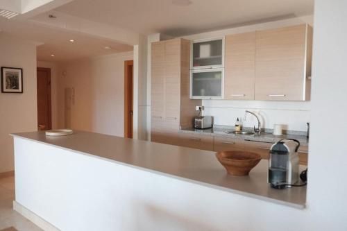 a kitchen with a counter top with a coffee maker on it at La Resina 3BD 2 BTH - SUN&RELAX in Estepona