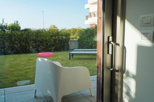 Κήπος έξω από το North Point Lignano Sabbiadoro