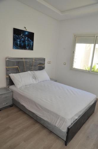 Llit o llits en una habitació de Luxury apartment in Sale El Jadida