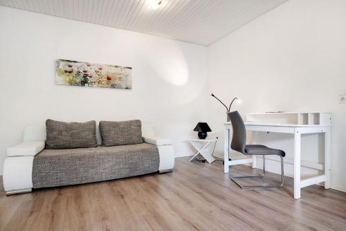 Posezení v ubytování Ferienwohnung am Fährhafen