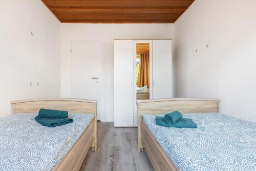 Postel nebo postele na pokoji v ubytování Ferienwohnung am Fährhafen