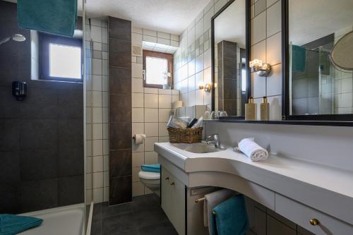 Kúpeľňa v ubytovaní Restaurant Appartements Almdiele