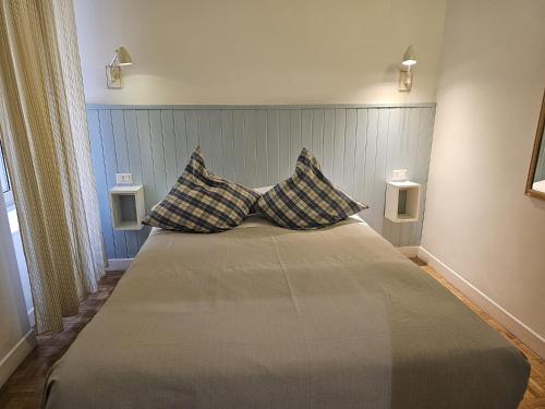 Кровать или кровати в номере Residenza I Rioni Guesthouse