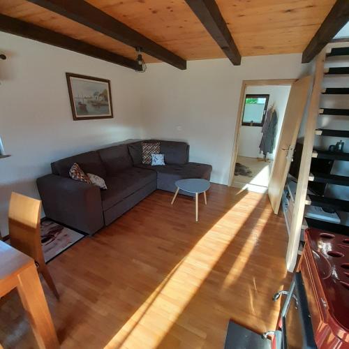 Zona de estar de Počitniška hiška pri Lipi