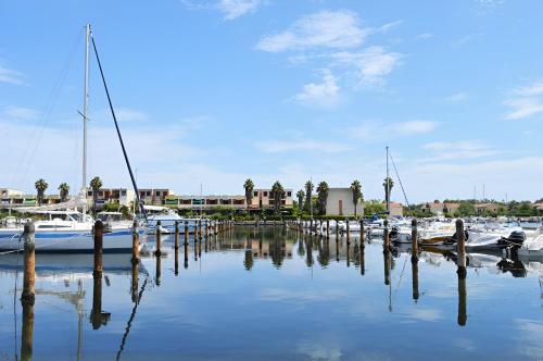 a group of boats docked in a marina at Endless Summer House in I Casoni