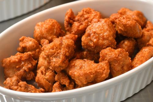 a white bowl filled with fried chicken bites at Dormy Inn Morioka in Morioka