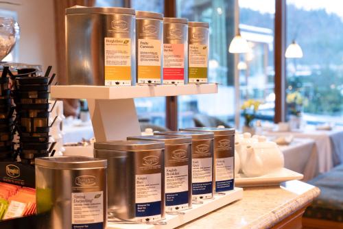 a bunch of products on a shelf in a store at Hotel Deimann in Schmallenberg