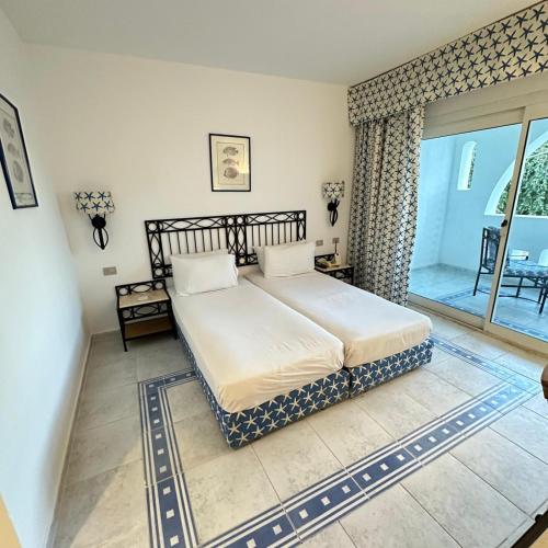 Suite privata al Domina club resort Acquamarine, Coral Bay, spa e casinó.