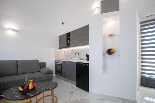 Kuchyň nebo kuchyňský kout v ubytování Elvis’ Home