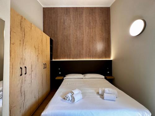 Posteľ alebo postele v izbe v ubytovaní Villaggio Miramare