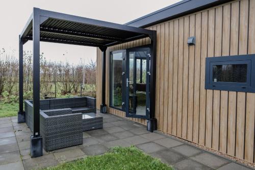 Zahrada ubytování Luxe chalet op minicamping in waarde met sauna