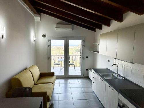 Kuchyň nebo kuchyňský kout v ubytování Grazioso e panoramico appartamento in zona residenziale a Sant'Antioco C54