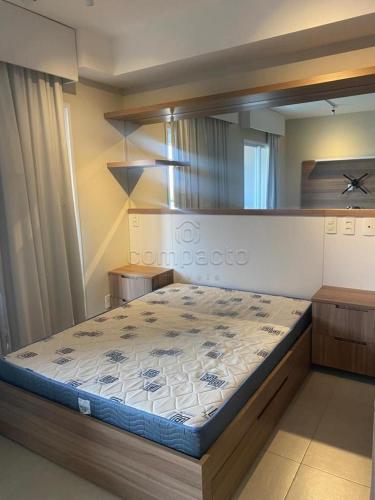 a bedroom with a bed in a room at FLATS - DUO JK in Sao Jose do Rio Preto