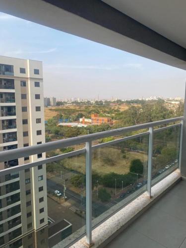 a view of a city from a balcony of a building at FLATS - DUO JK in Sao Jose do Rio Preto