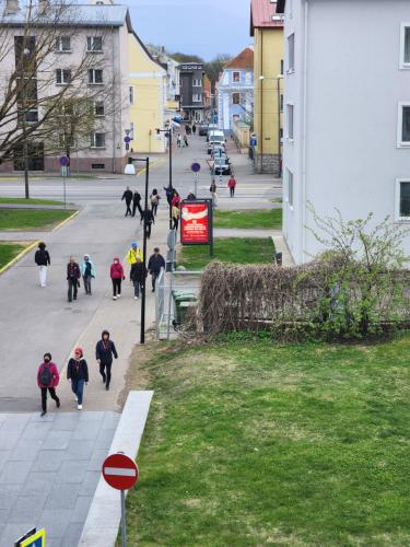 a group of people walking down a street at PÄRNU CENTER in Pärnu