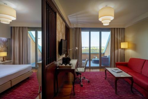 Postel nebo postele na pokoji v ubytování UNA HOTELS Expo Fiera Milano