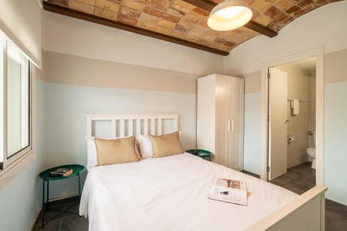 Posteľ alebo postele v izbe v ubytovaní Collblanc Apartment by Olala Homes