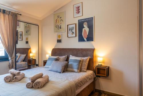 Postel nebo postele na pokoji v ubytování Casa Vigo Pula